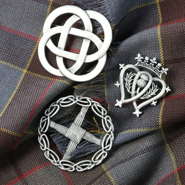 Three celtic knots on a plaid cloth.